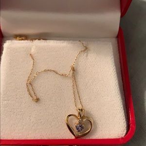 Heart pendant necklace with diamond. Yellow Gold